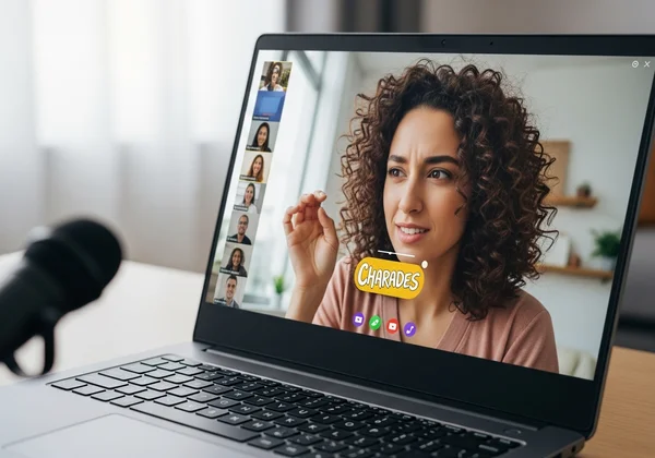 Person set up for virtual charades on a video call.